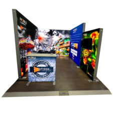Mobile Lightbox Display stand with 4 back lit walls and a back lit counter and flooring